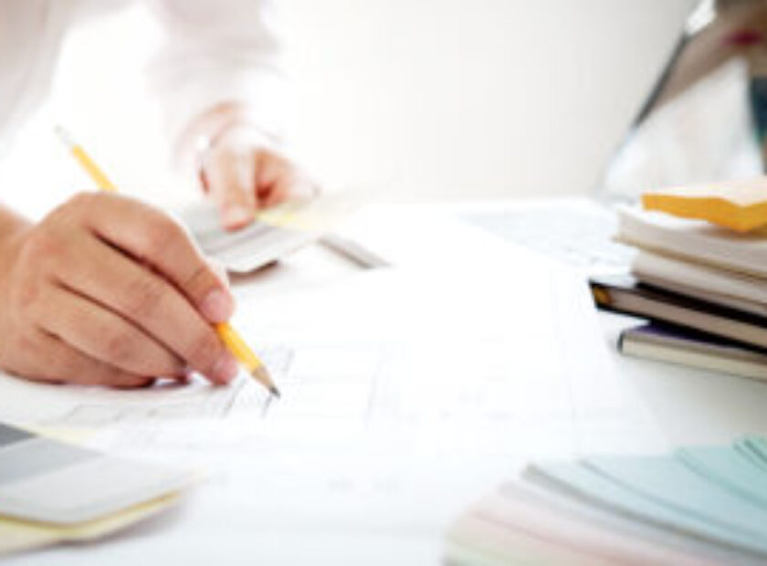 Graphic design and color swatches and pens on a desk. Architectu
